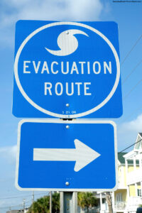 Hurricane evacuation route sign with arrow