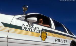 Navajo nation police officer in cruiser.