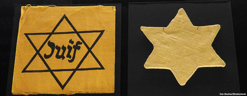 Star of David patches worn by Jews in territories occupied by the Third Reich. On the left side a yellow star with the word Juif (Jew) in French and on the right side is a yellow star worn in Hungary