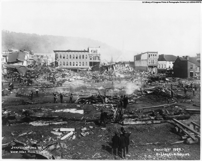 Black and white photograph of the 1889 Johnstown, Pennsylvania flood near Main Street.