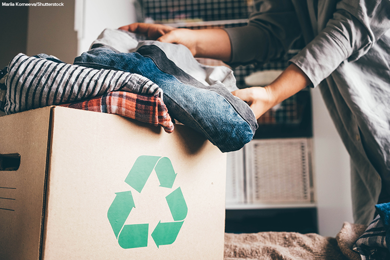 Recycling box full of clothes