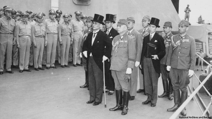 Japanese World War II surrender signatories, standing in front are: Foreign Minister Mamoru Shigemitsu and General Yoshijiro Umezu Chief of the Army General Staff, aboard the USS MISSOURI, September 2, 1945.
