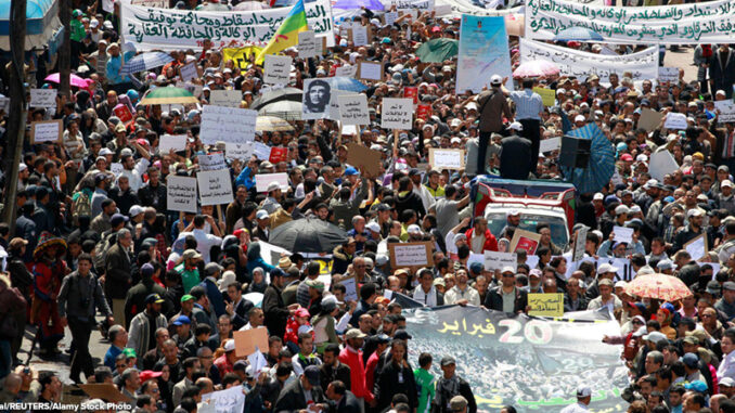 People gather for a protest in Casablanca April 24, 2011. Thousands took to the streets of Morocco on Sunday in peaceful demonstrations to demand sweeping reforms and an end to political detention, the third day of mass protests since they began in Februa People gathered for a protest in Casablanca.