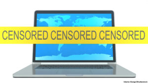 Internet censorship. laptop and yellow ribbon with the inscription censorship