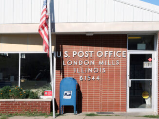 Exterior view of the United States Post Office building, London Mills. Illinois,