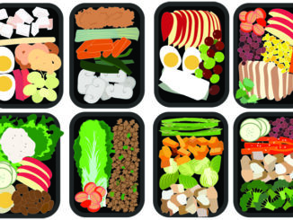 graphid of different meals in black trays