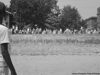 People marching from the Little Rock, Arkansas capitol to Central High School in 1959.