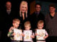 Dolly Parton with children celebrating the start of the Imagination Library in London, England
