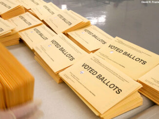 Absentee ballots being sorted and prepared for recording at the Ada County Elections building in Boise, Idaho.