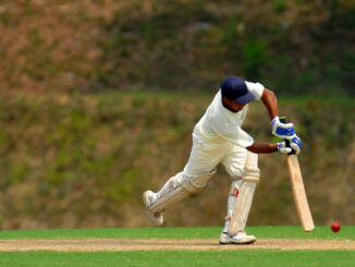 A cricket batsman getting ready to hit