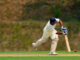 A cricket batsman getting ready to hit