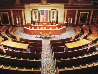 The Chamber of the House of Representatives is shown empty,
